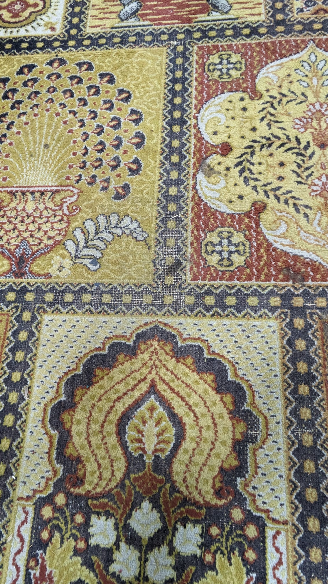 A Prado Orient 'Kashan Super' carpet with divided field of stylised flowers, peacocks and other motifs, multi-bordered, 372 x 275cm